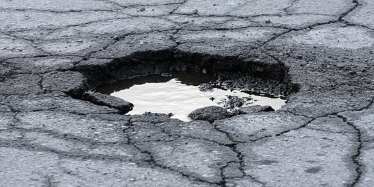 Pothole on Lowell Avenue Leads to $150K Settlement With Injured Motorcyclist